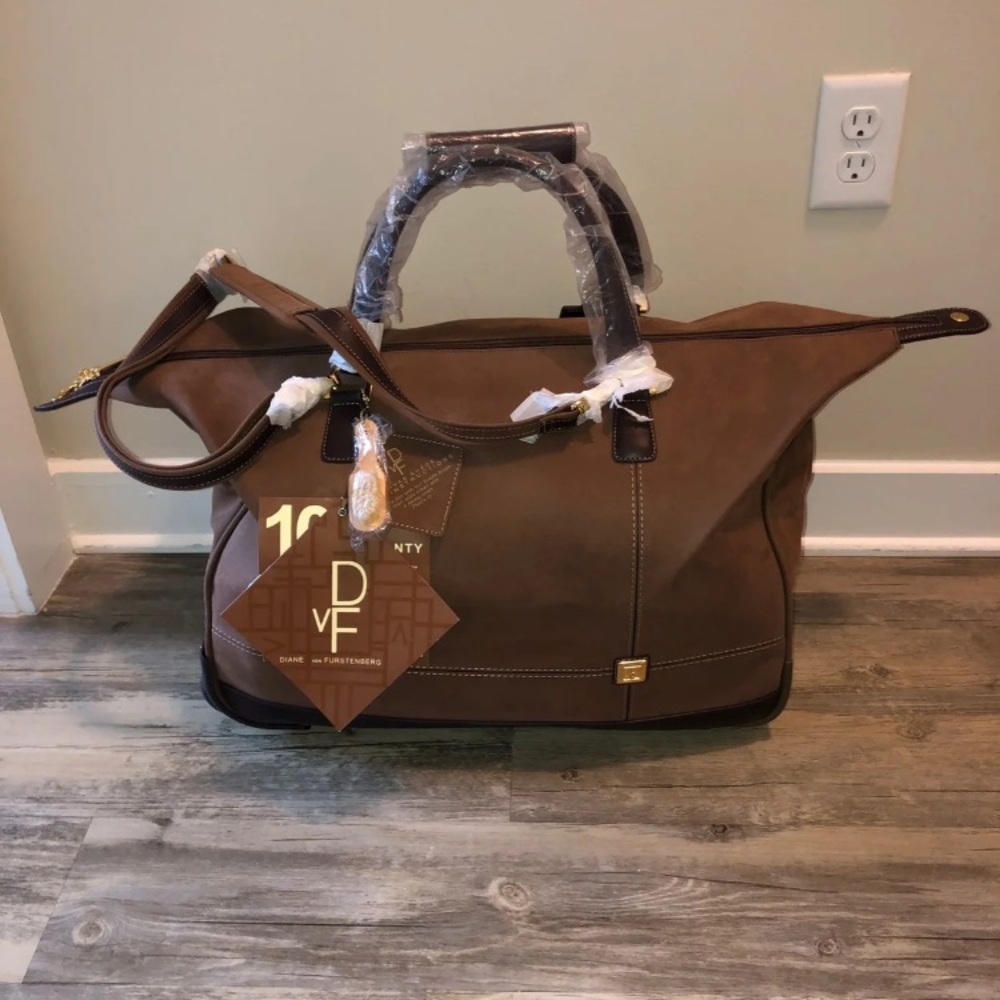 diane von furstenberg 20” wheeled carryon bag